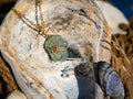 Aqua sea glass oval pendant in gold setting